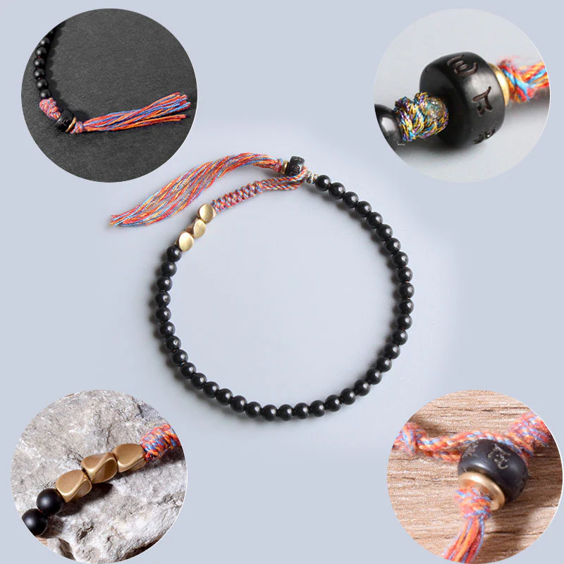 Braccialetto fatto a mano in onice nero tibetano con nappa Buddha Stones - Image 10